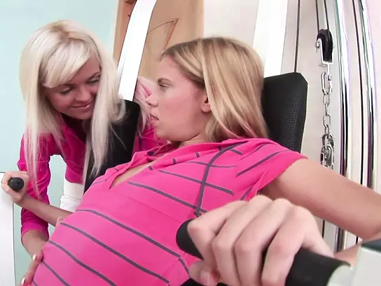 Watch these young babes strip down and pleasure each other with big dildos XXX Video